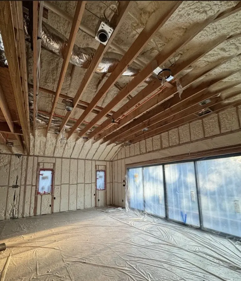 Interior walls and ceiling insulated with spray foam during new construction in Bedford Heights